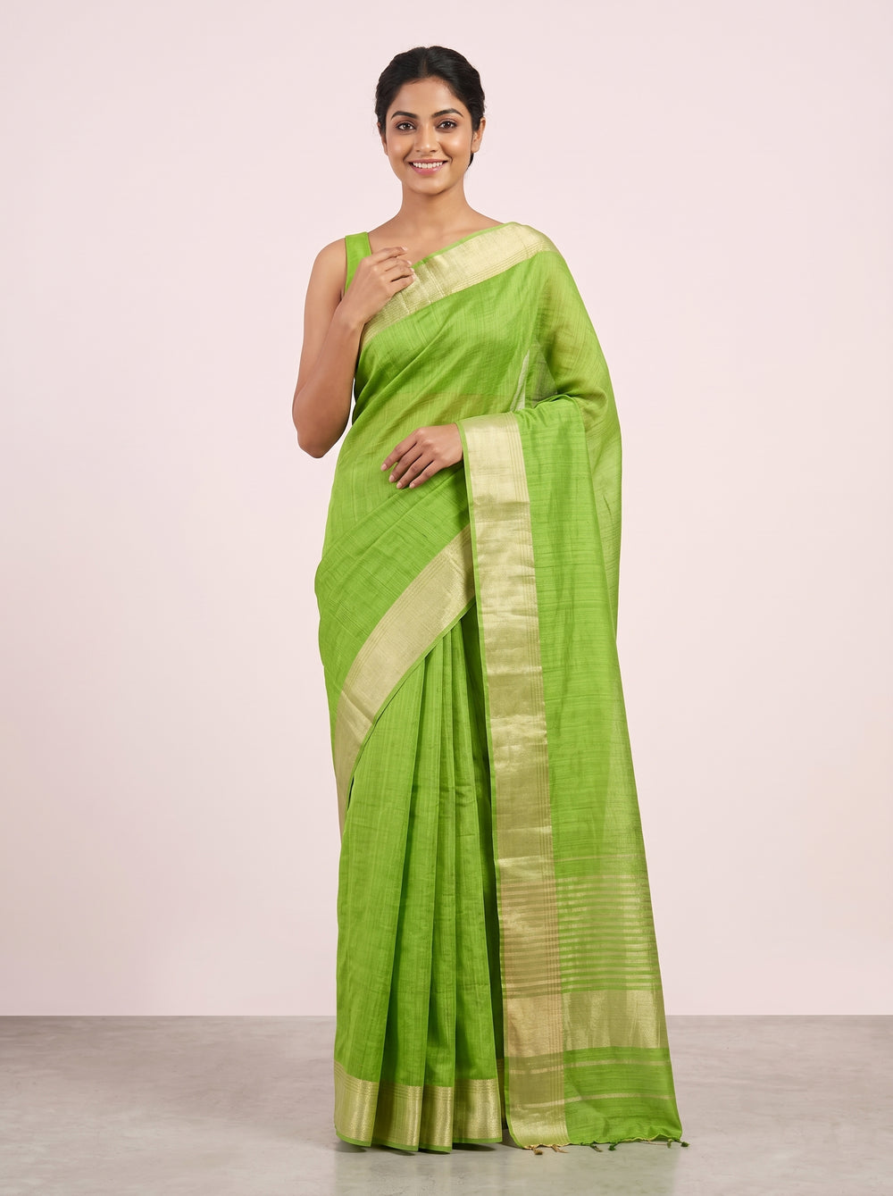 The Fresh Green Plain Jute Silk Saree with Golden Border